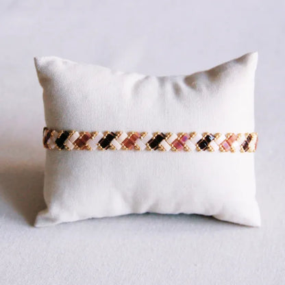 Gevlochten tilabead armband - nude colors