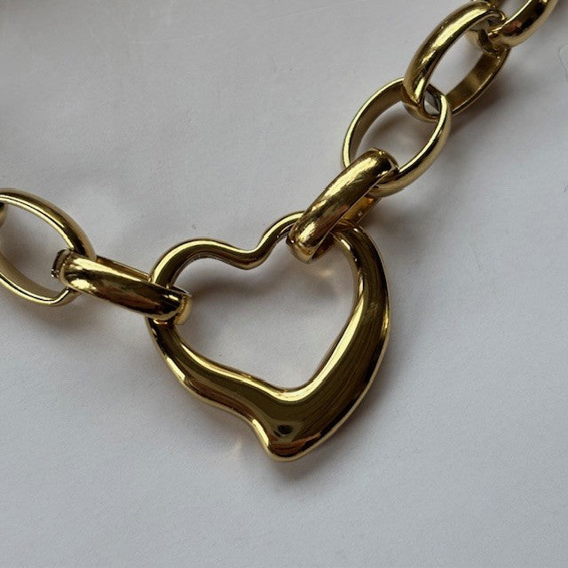 Ketting: RVS schakelketting Jacey met open hart: goud