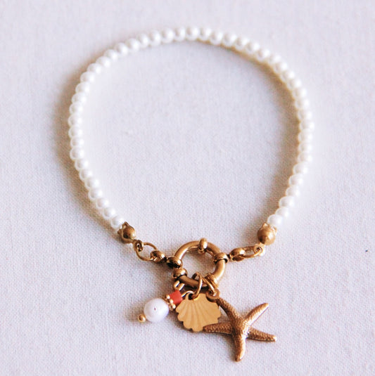 Parel armbandje met zeester, schelpje en parel