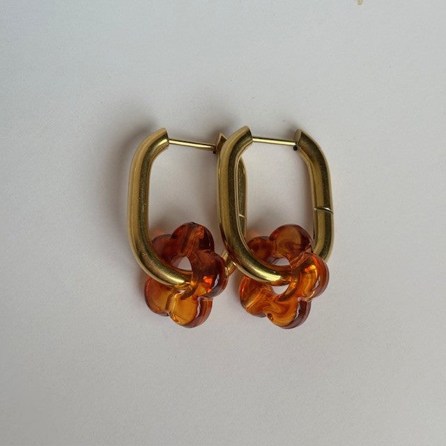 Oorbellen: Creolen met bloem hanger