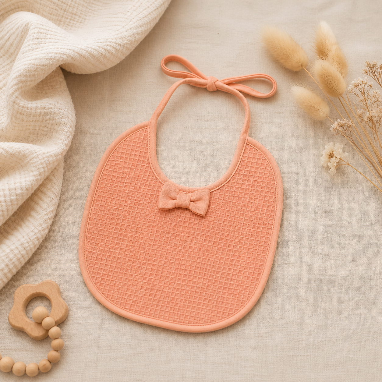 Slabbetje rond met strik rose cloud